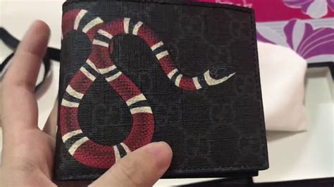 black gucci wallet real vs fake|authentic gucci snake wallet.